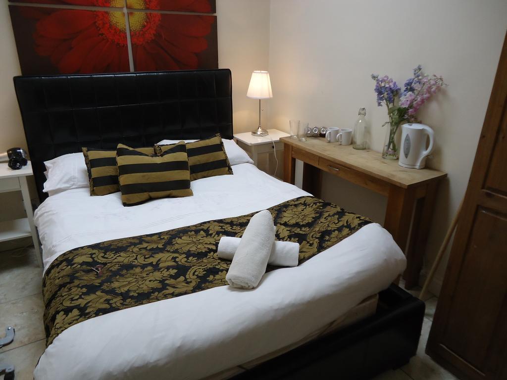 Kings Cross Guesthouse Лондон Стая снимка